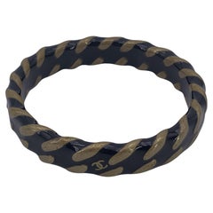 Braccialetto Chanel Vintage in metallo dorato e smalto nero