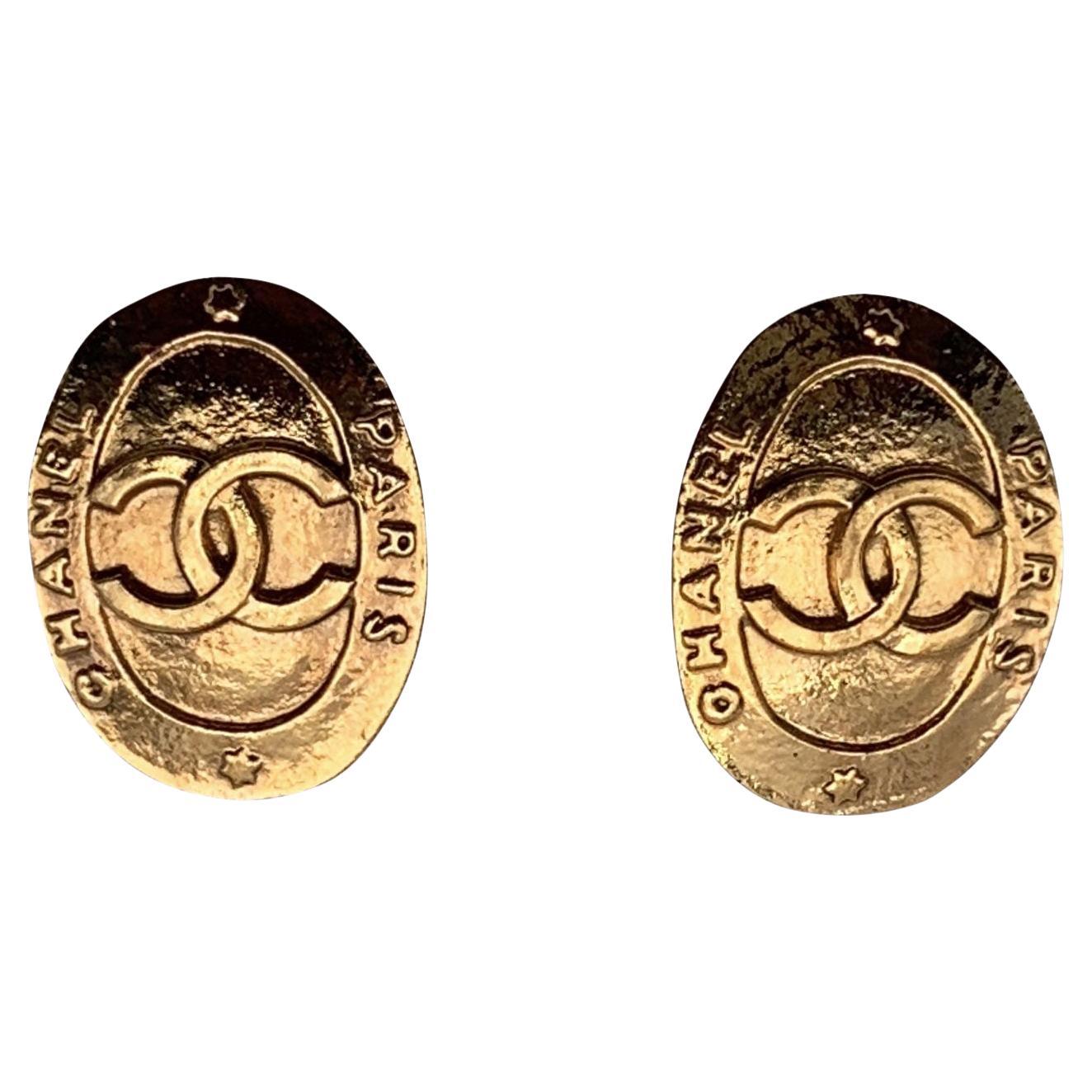Chanel Vintage Gold Metal Oval Embossed CC Logo Clip On Earrings For Sale