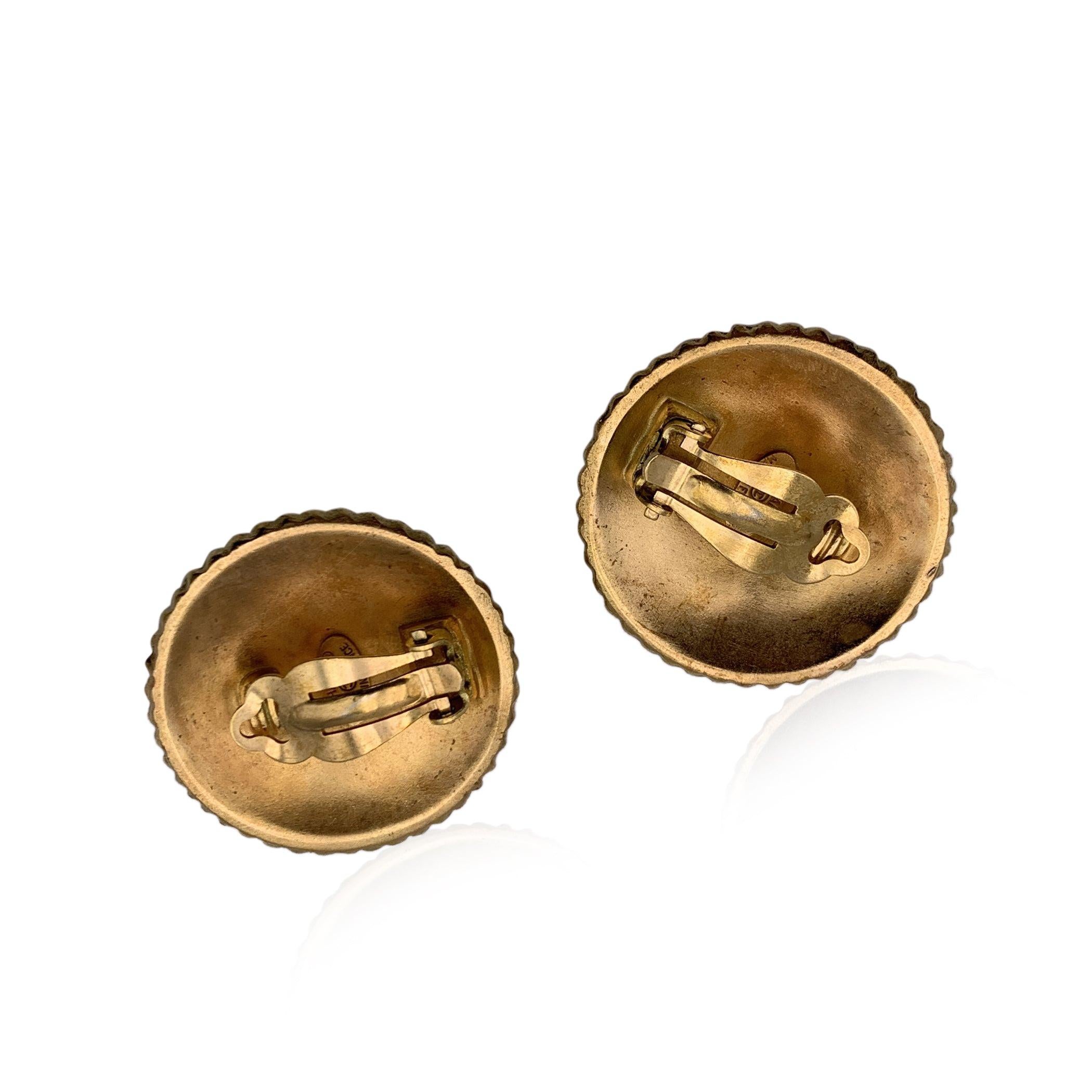 Gorgeous vintage CHANEL round gold metal earrings with contrast Coco Chanel writings. Clip-on design. Signed 'Chanel - CC - Made in France' oval hallmark on the reverse of the earring. Diameter: 34 mm Condition A - EXCELLENT Gently used. Please,