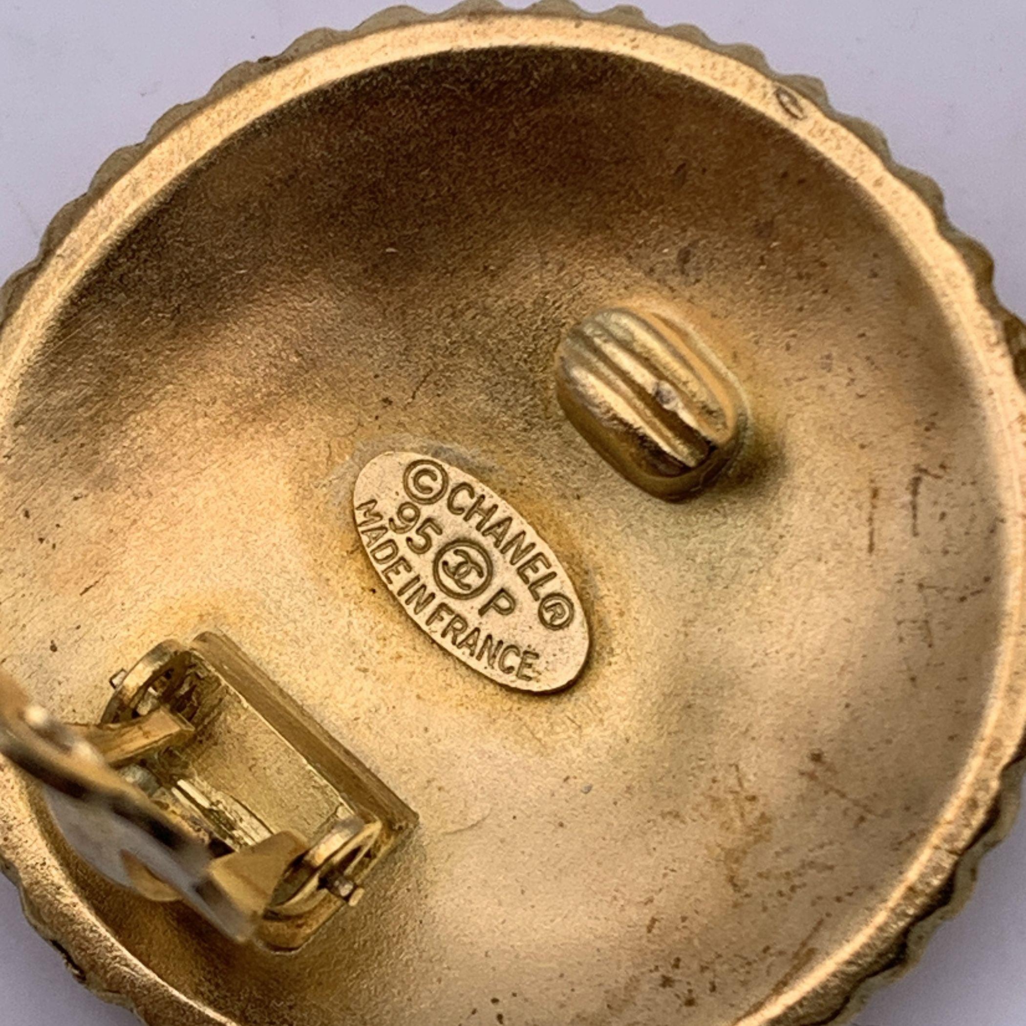 Chanel Vintage Gold Metal Round Coco Chanel Clip On Earrings In Excellent Condition In Rome, Rome