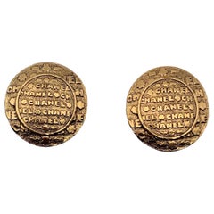 Chanel Vintage Gold Metal Round Embossed Clip On Earrings