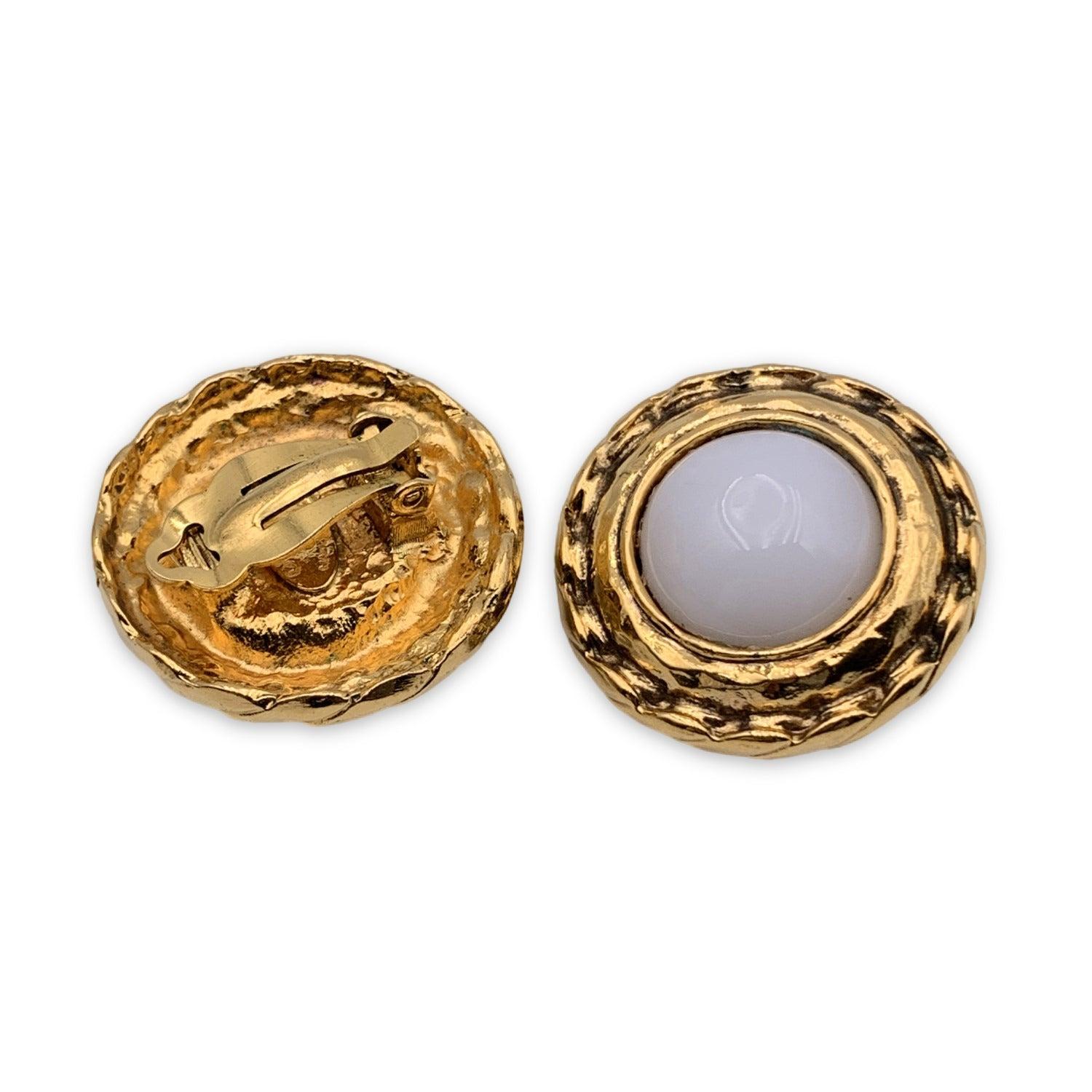 Gorgeous vintage CHANEL earrings. White Cabochon and gold metal frame. Clip-on earrings. Signed 'Chanel CC - Made in France' oval hallmark on the reverse of the earring. Diameter: 1.25 inches - 32mm Condition B - VERY GOOD Gently used. A small
