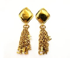 Chanel Vintage Gold Plated Argyle Letter Chain Dangle Clip on Earrings