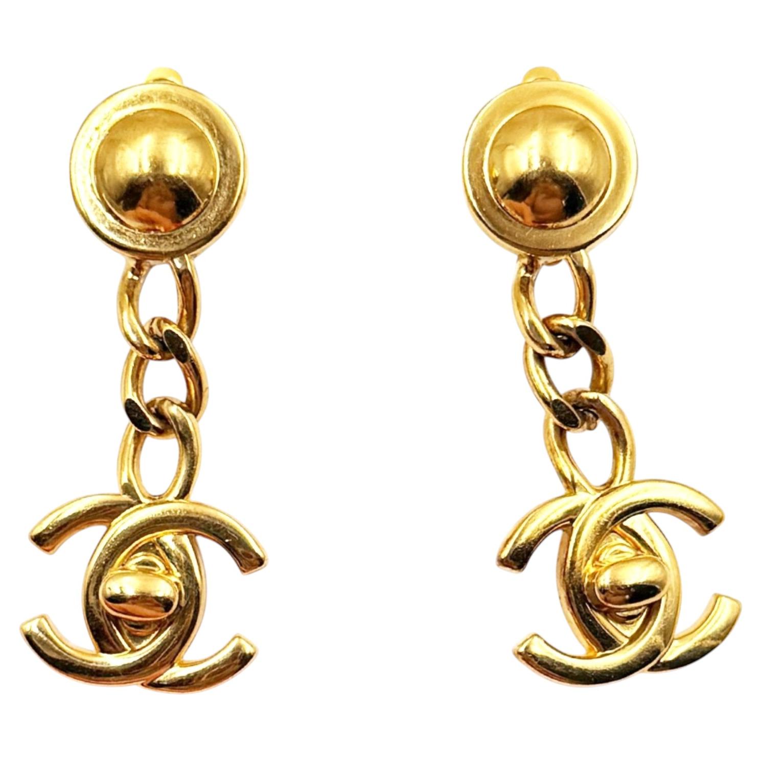 Chanel Vintage Gold Plated Button Chain CC Turnlock Dangle Clip on Earrings For Sale