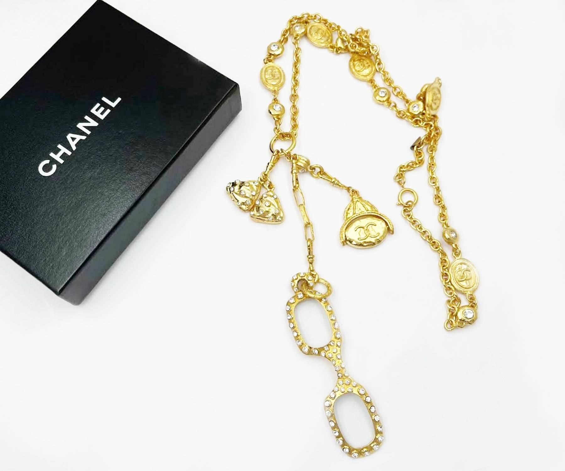 Chanel Vintage Gold Plated CC Coin 3 Charm Magnifying Glasses Long Necklace

* Marked Chanel
* Made in France
* Comes with the original box

-It is approximately 34″ long. The longest charm is 7″ long. The magnifying glasses are 3.5″ x 1″.
-The