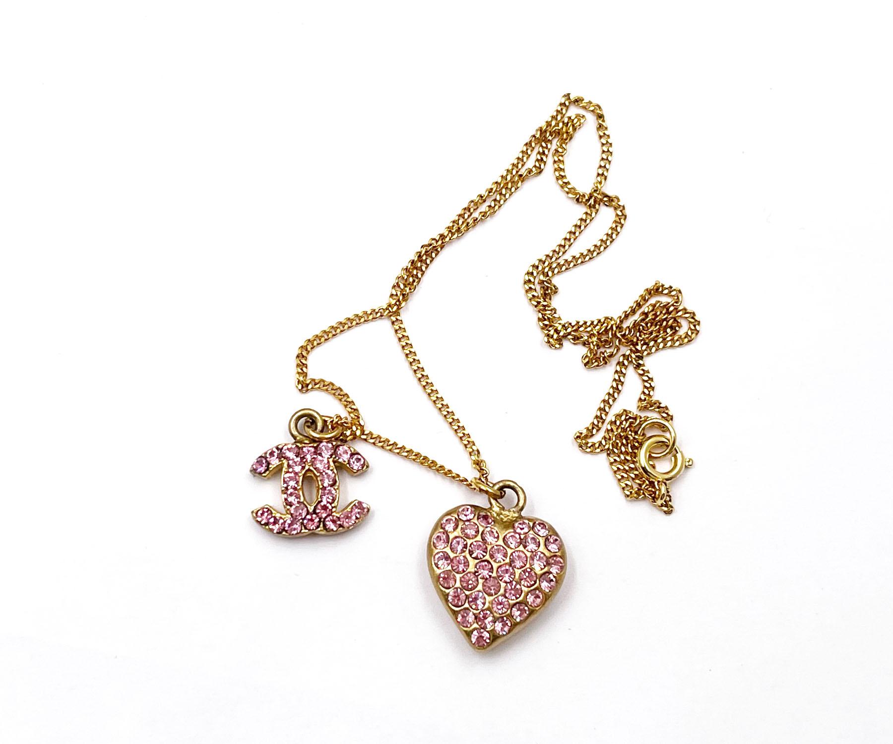 Chanel Vintage Gold Plated CC Heart Pink Crystal Necklace

*Marked 02
*Made in France
*Comes with the original box and tag

-The chain is approximately 16.5