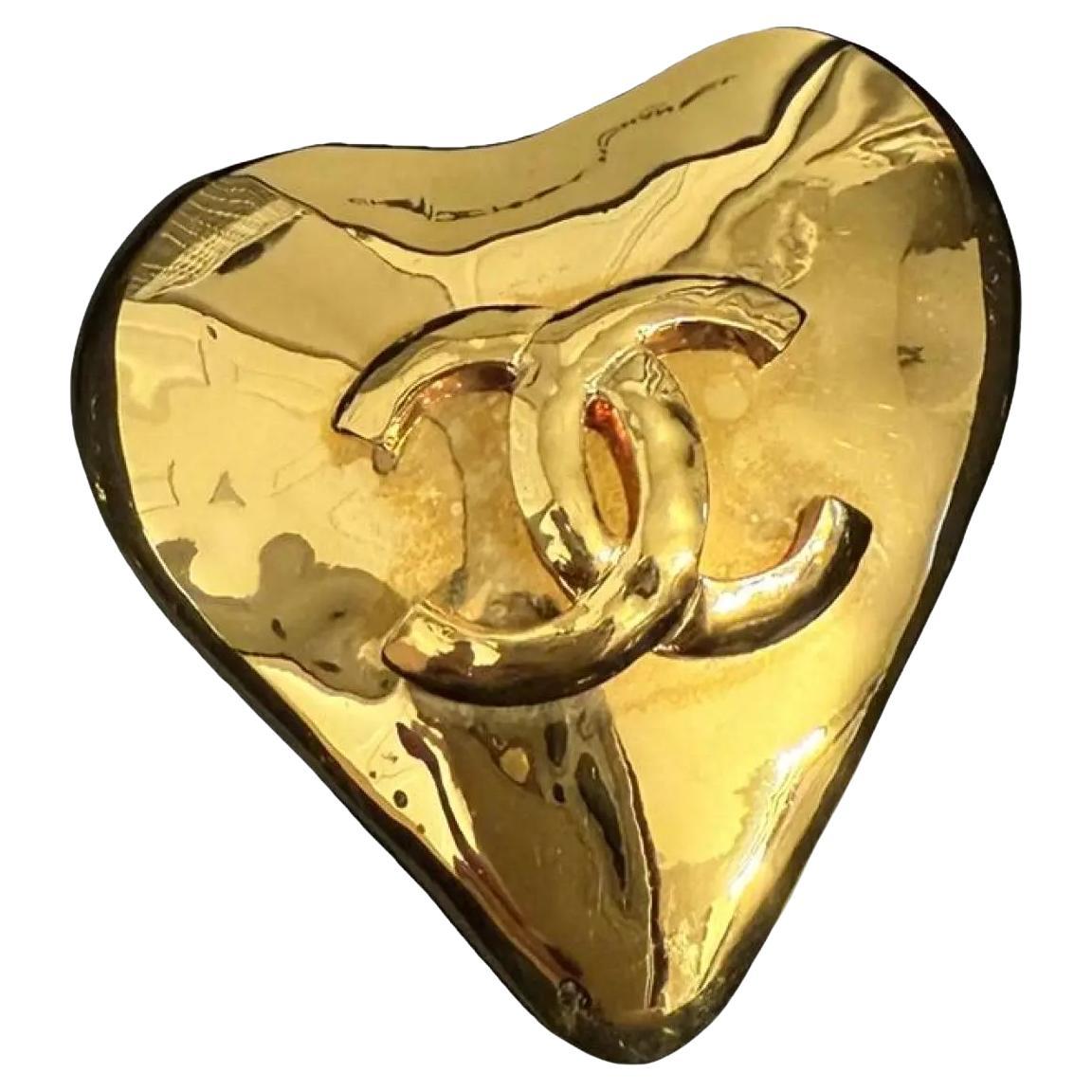 How do I authenticate a Chanel brooch?