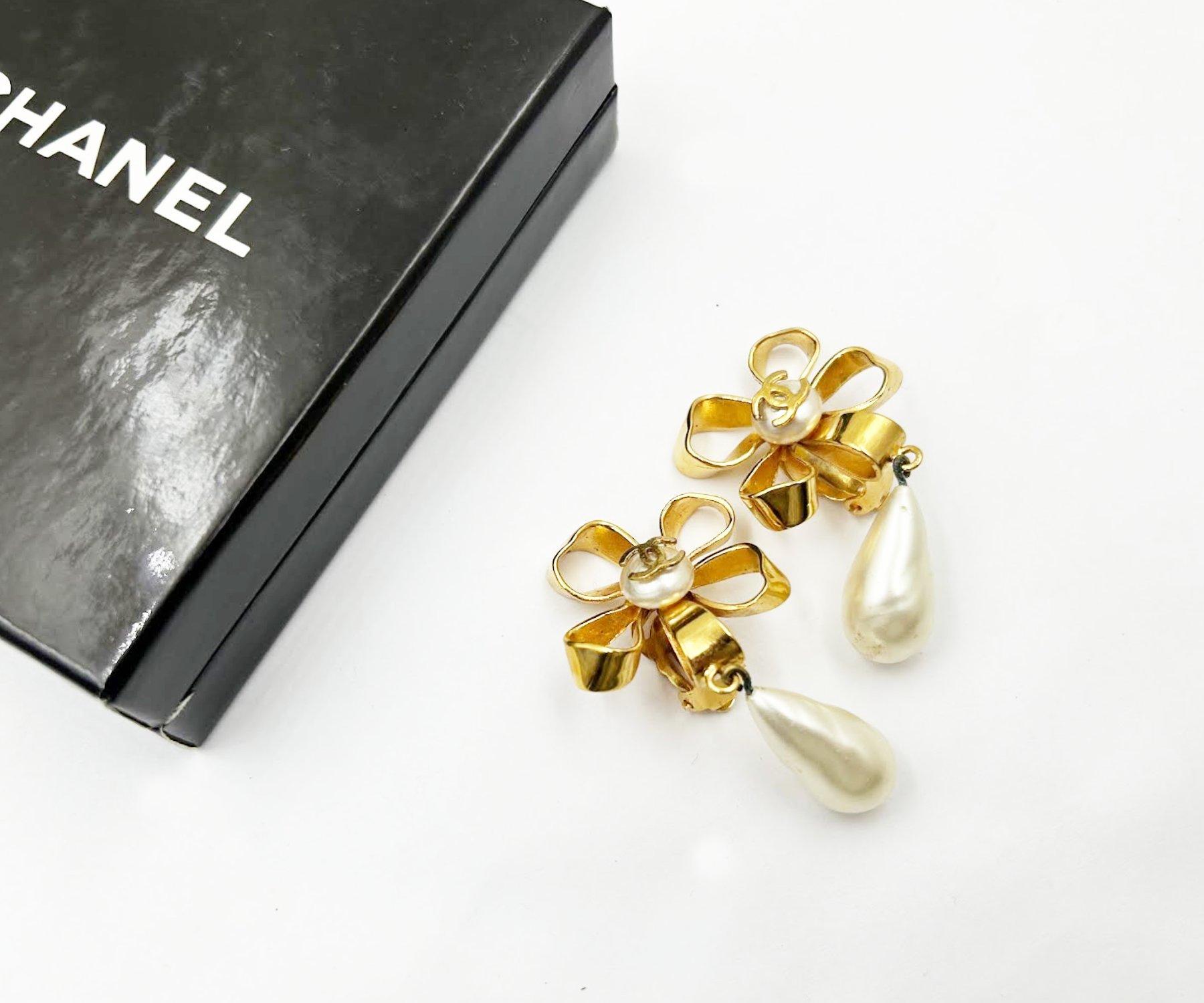 Artisan Chanel Vintage Gold Plated CC Ribbon Flower Pearl Dangle Clip on Earrings For Sale