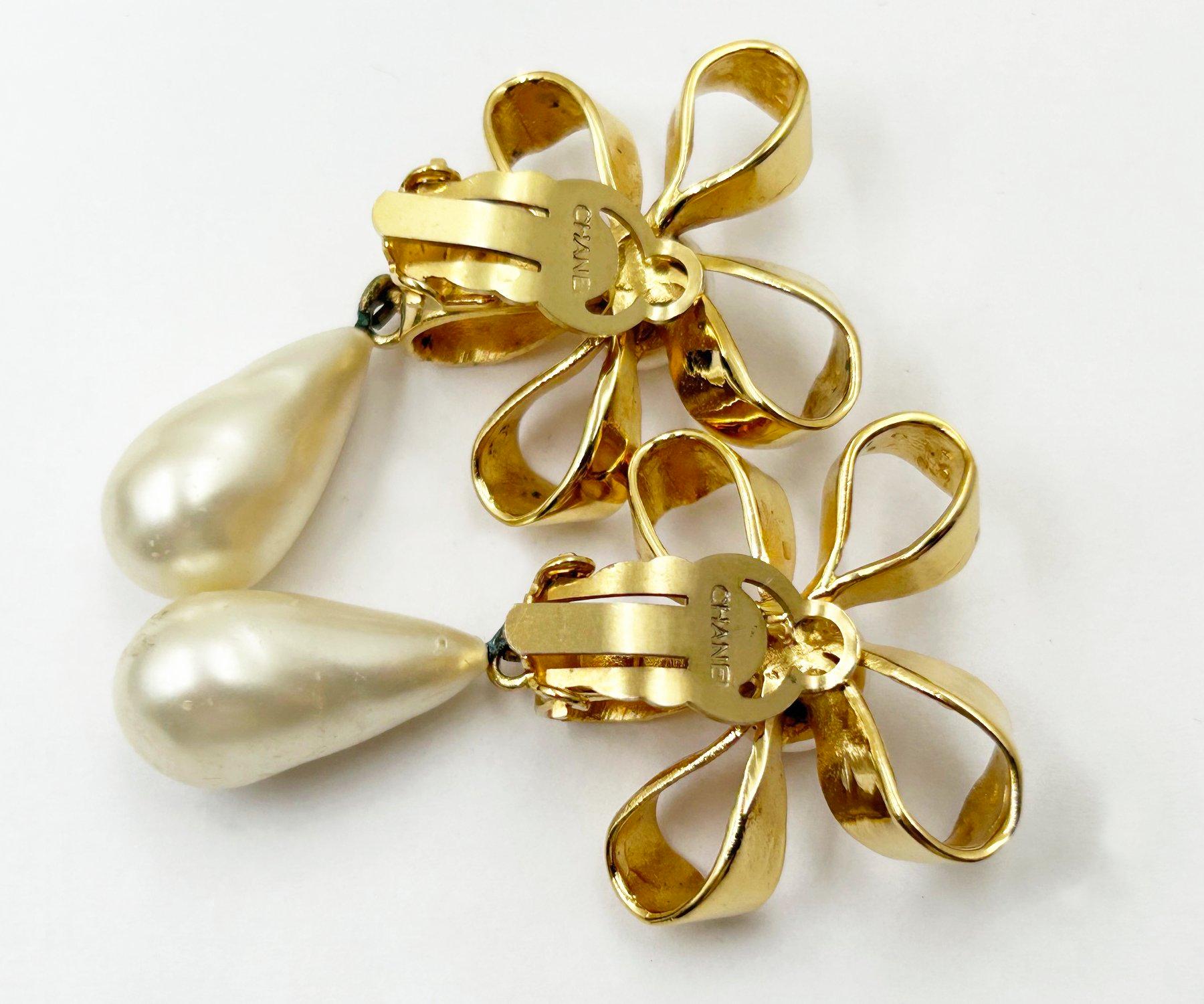 Chanel Vintage Gold Plated CC Ribbon Flower Pearl Dangle Clip on Earrings For Sale 1