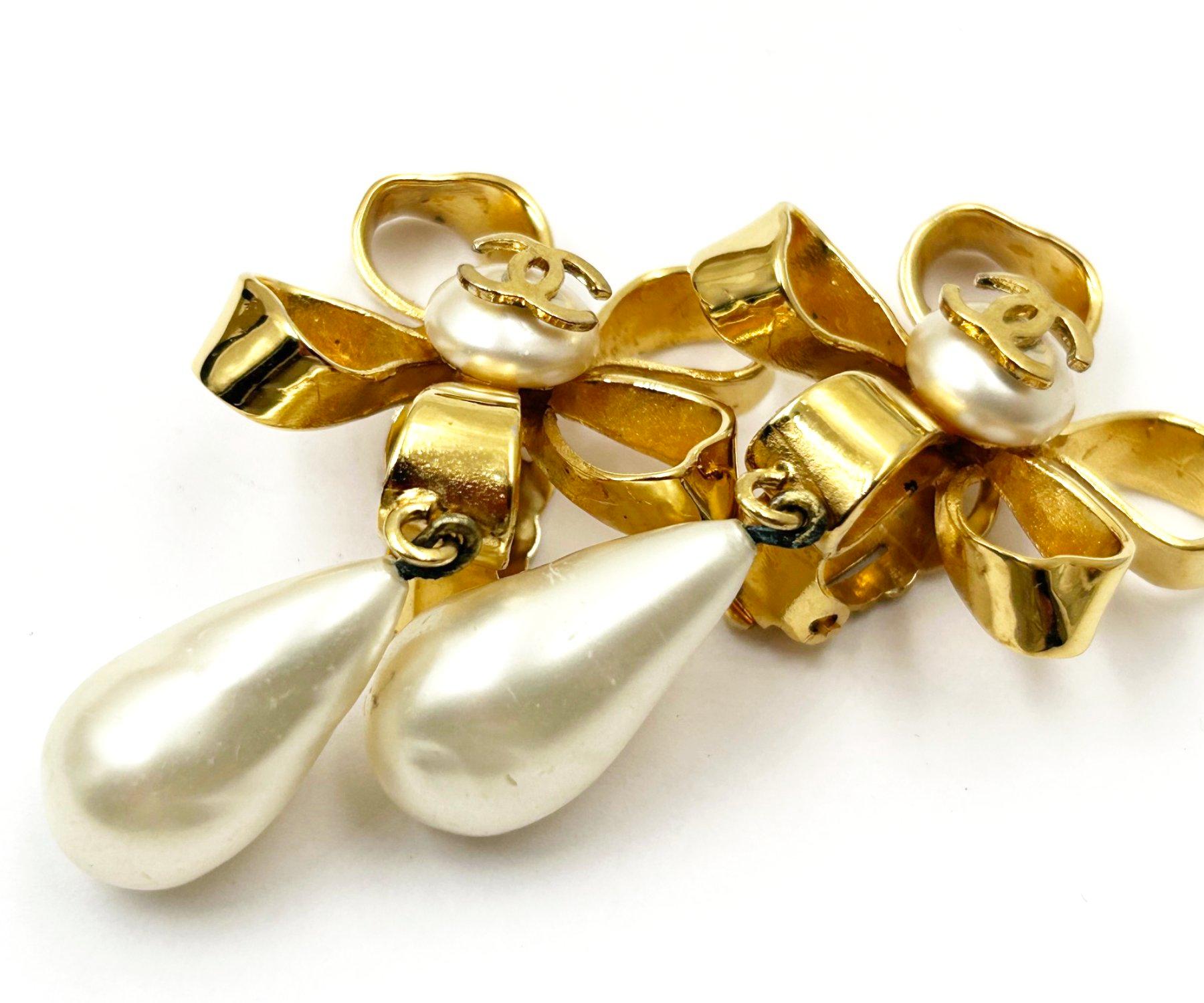 Chanel Vintage Gold Plated CC Ribbon Flower Pearl Dangle Clip on Earrings For Sale 2