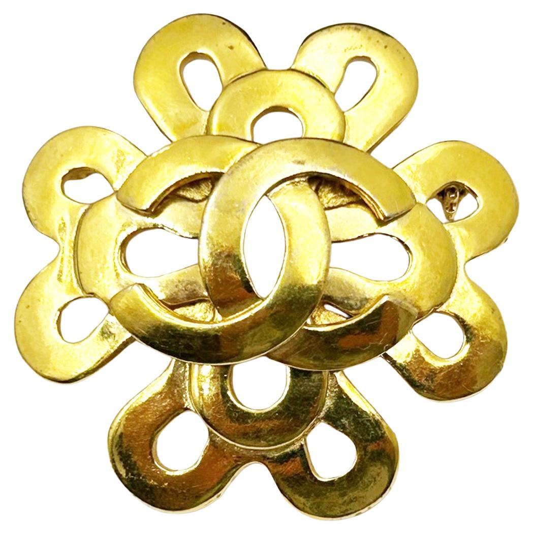 Chanel Vintage Gold Plated CC Twisted Flower Brooch  For Sale