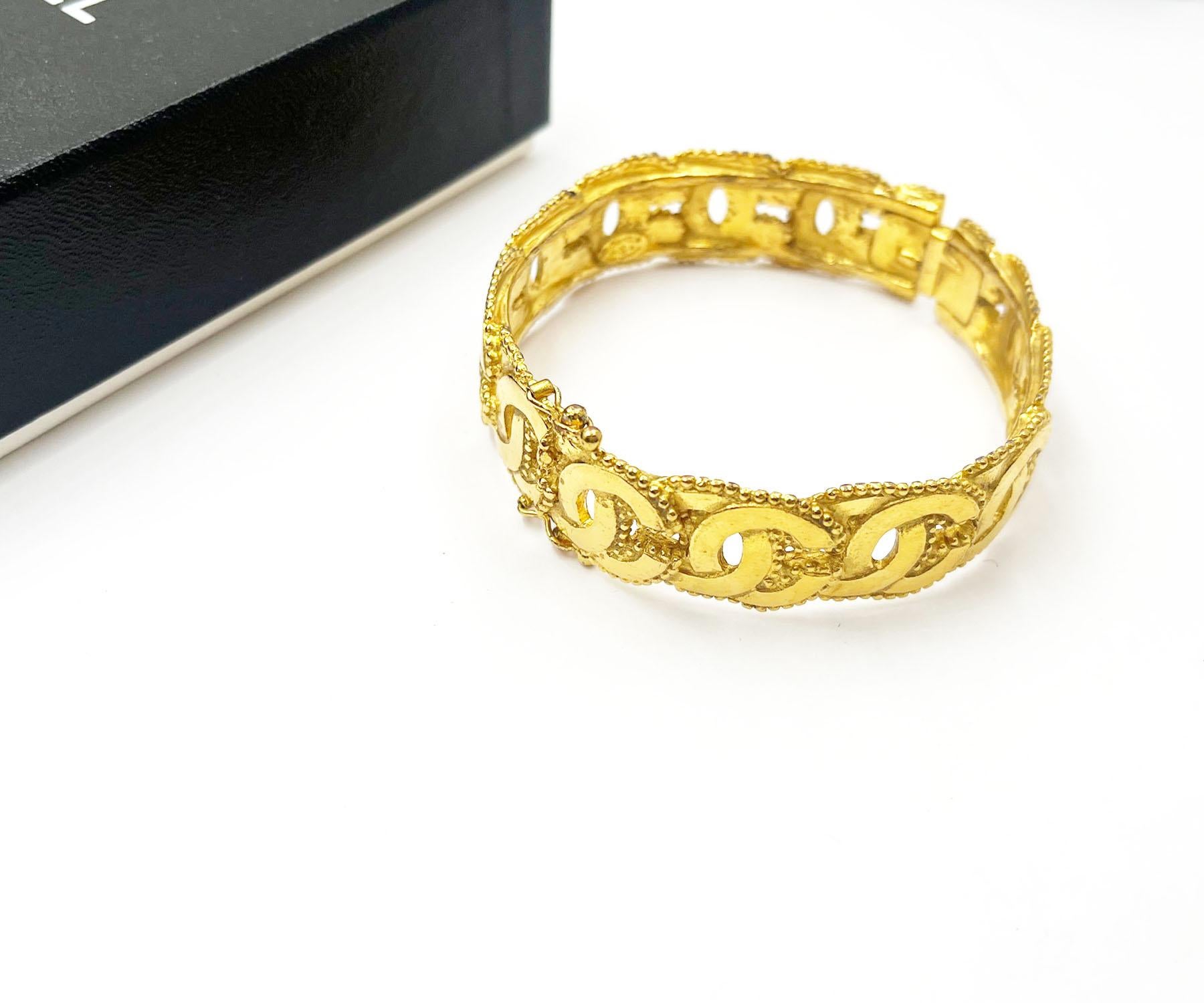 Artisan Chanel Vintage Gold Plated Multi CC Dots Bangle Bracelet   For Sale