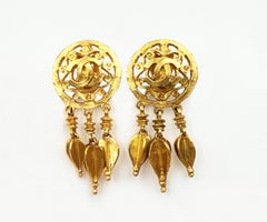 Chanel Vintage Gold Plated Round CC  Filigree  Spear Dangle Clip on Earrings