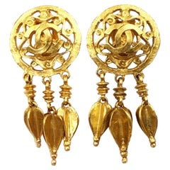 Chanel Vintage Gold Plated Round CC  Filigree  Spear Dangle Clip on Earrings