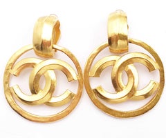 Chanel Vintage Gold Plated Round CC Large Clip on Earrings as seen on Doutzen