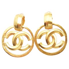 Chanel Vintage Gold Plated Round CC Large Clip on Earrings as seen on Doutzen