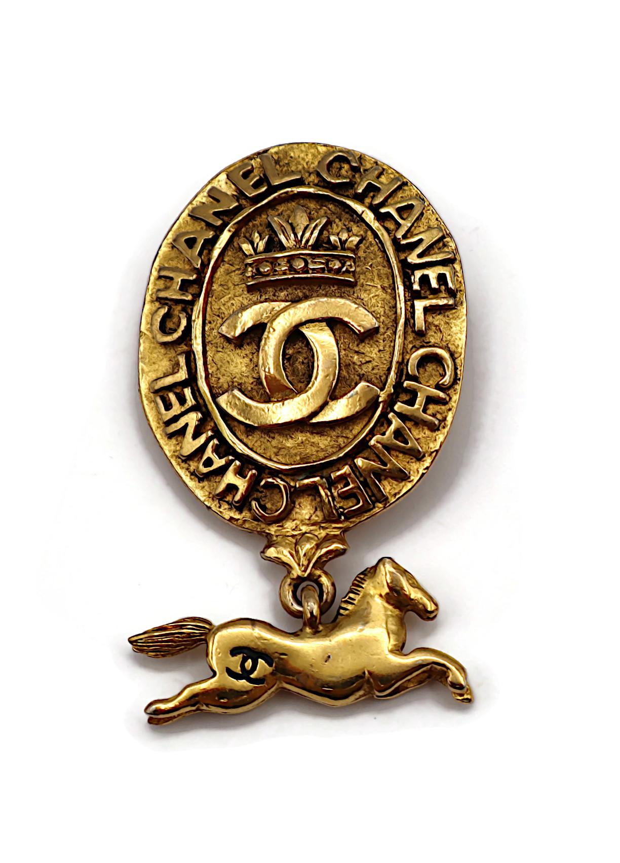 Women's CHANEL Vintage Gold Tone Crown Horse Charm Medallion Brooch For Sale