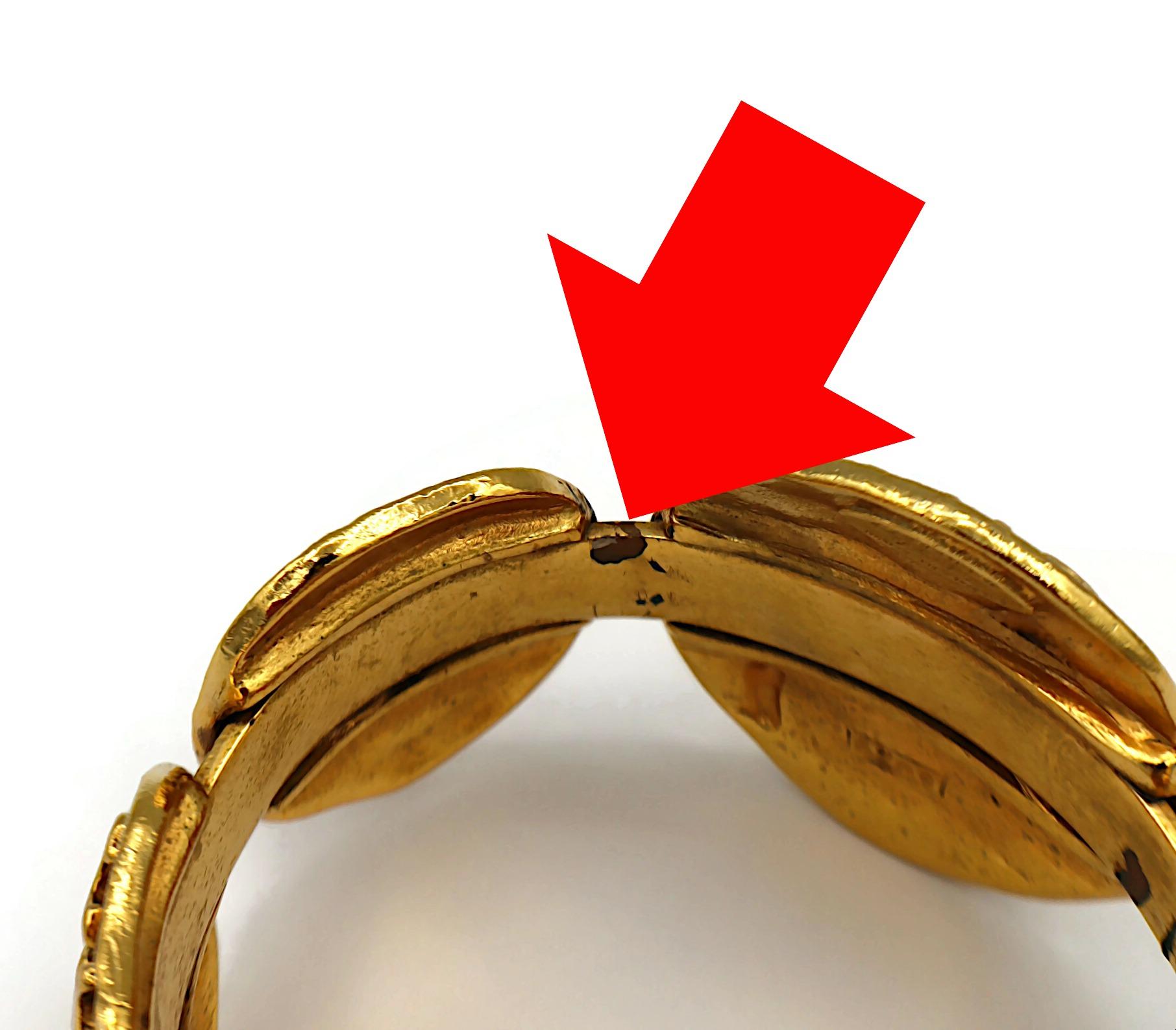 CHANEL Vintage Gold Tone Lion Medallion Bangle Bracelet For Sale 8