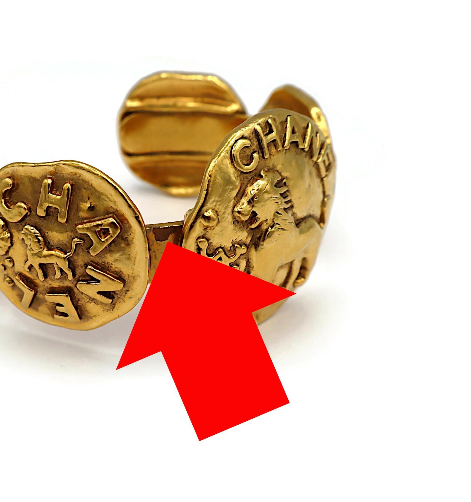 CHANEL Vintage Gold Tone Lion Medallion Bangle Bracelet For Sale 9