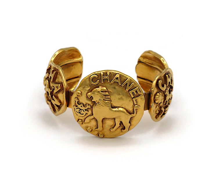 CHANEL Vintage Gold Tone Lion Medallion Bangle Bracelet For Sale