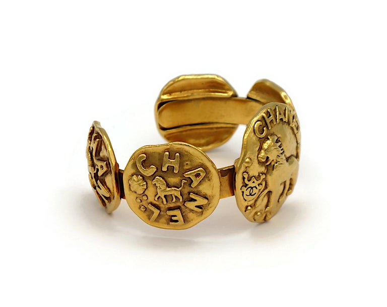 CHANEL Vintage Gold Tone Lion Medallion Bangle Bracelet For Sale