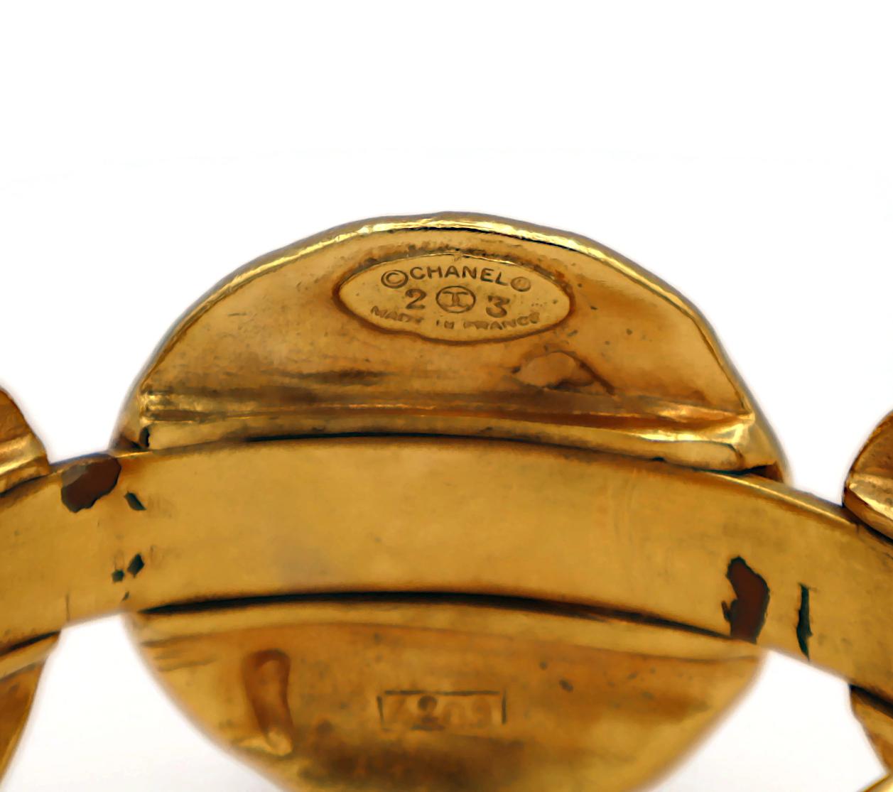 CHANEL Vintage Gold Tone Lion Medallion Bangle Bracelet For Sale 6