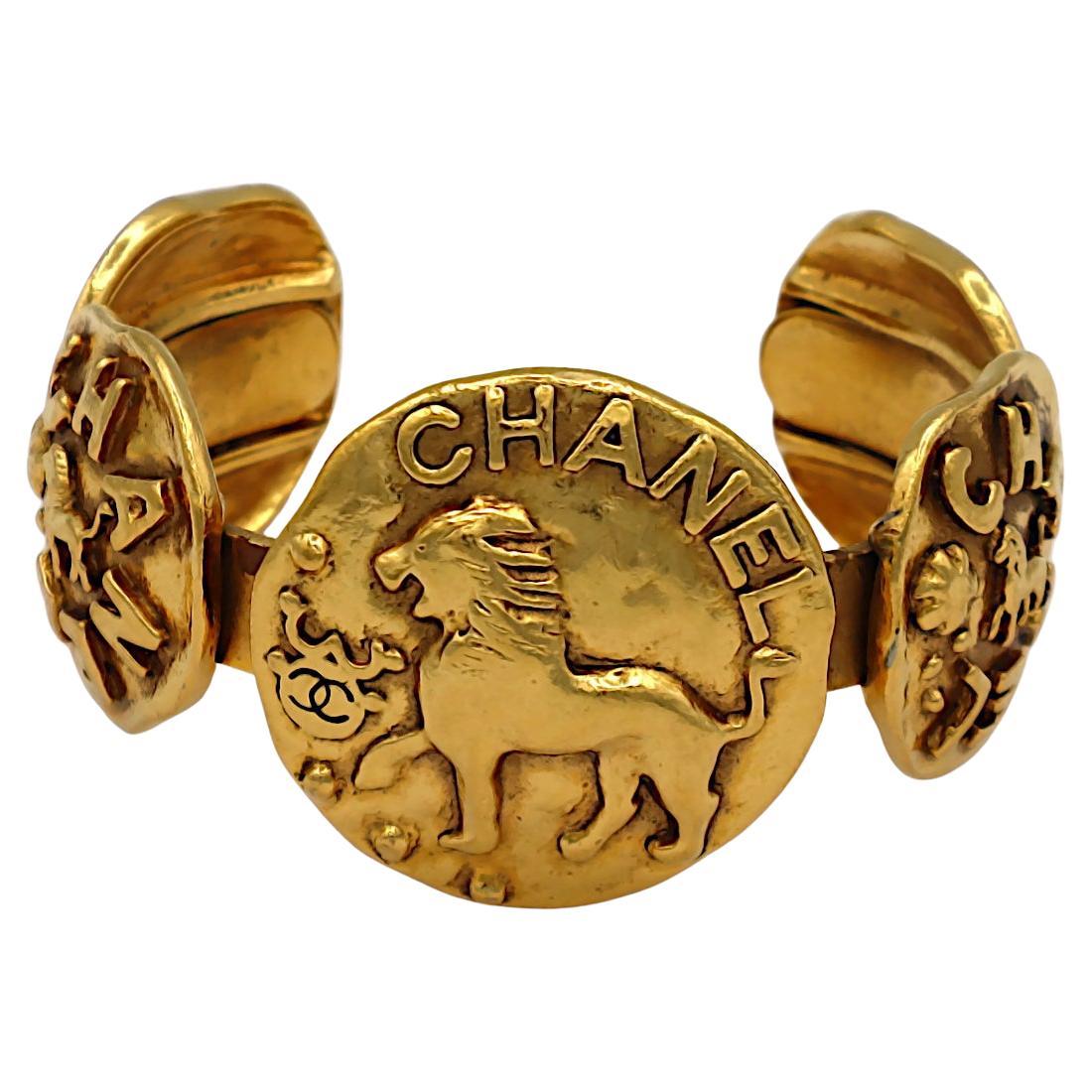 CHANEL Vintage Gold Tone Lion Medallion Bangle Bracelet