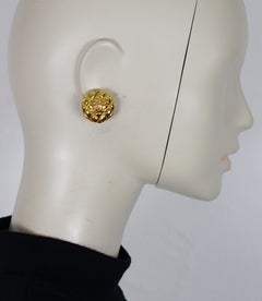 Orecchini a clip Chanel vintage in oro trapuntati CC