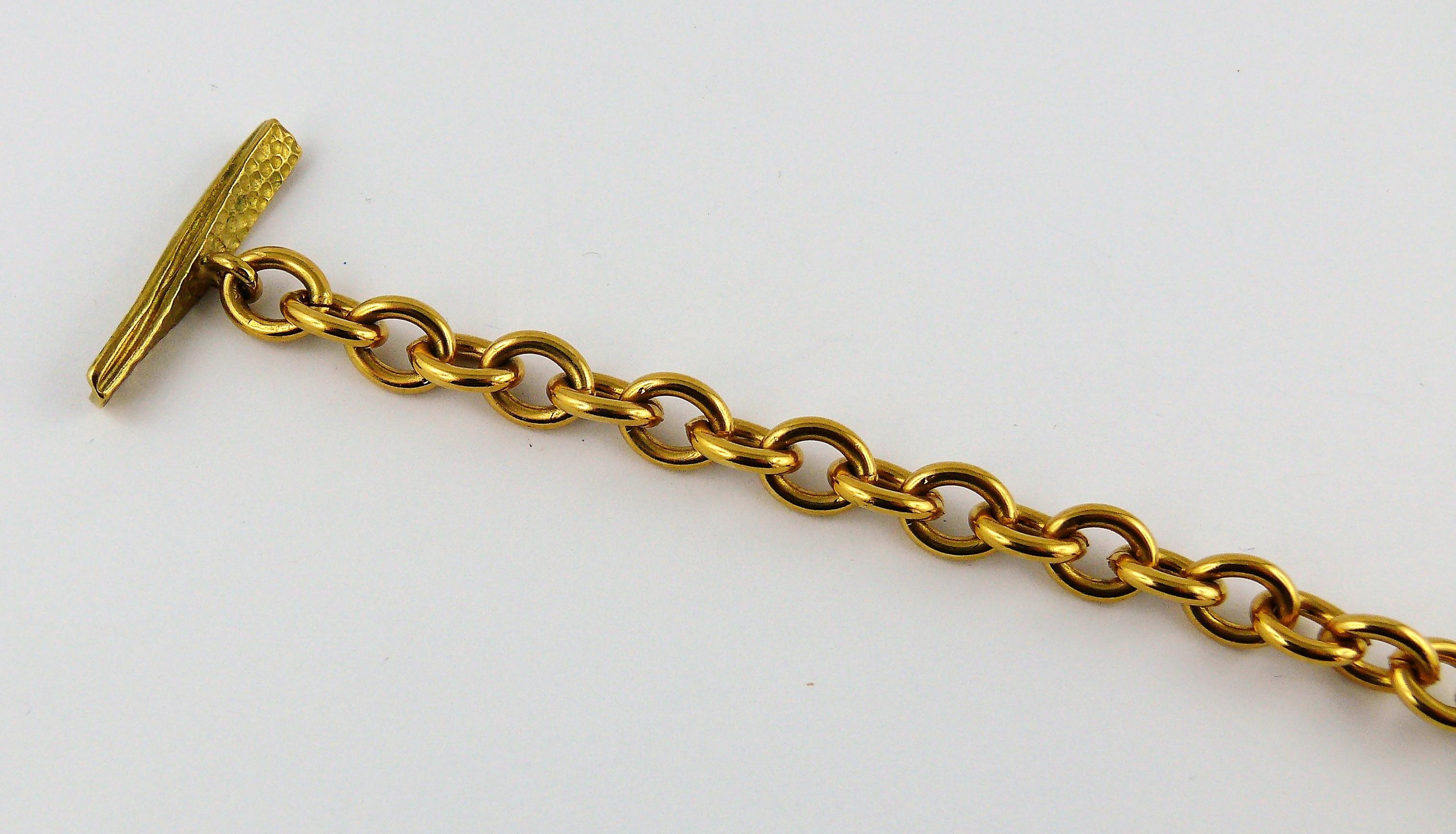 chanel cross pendant