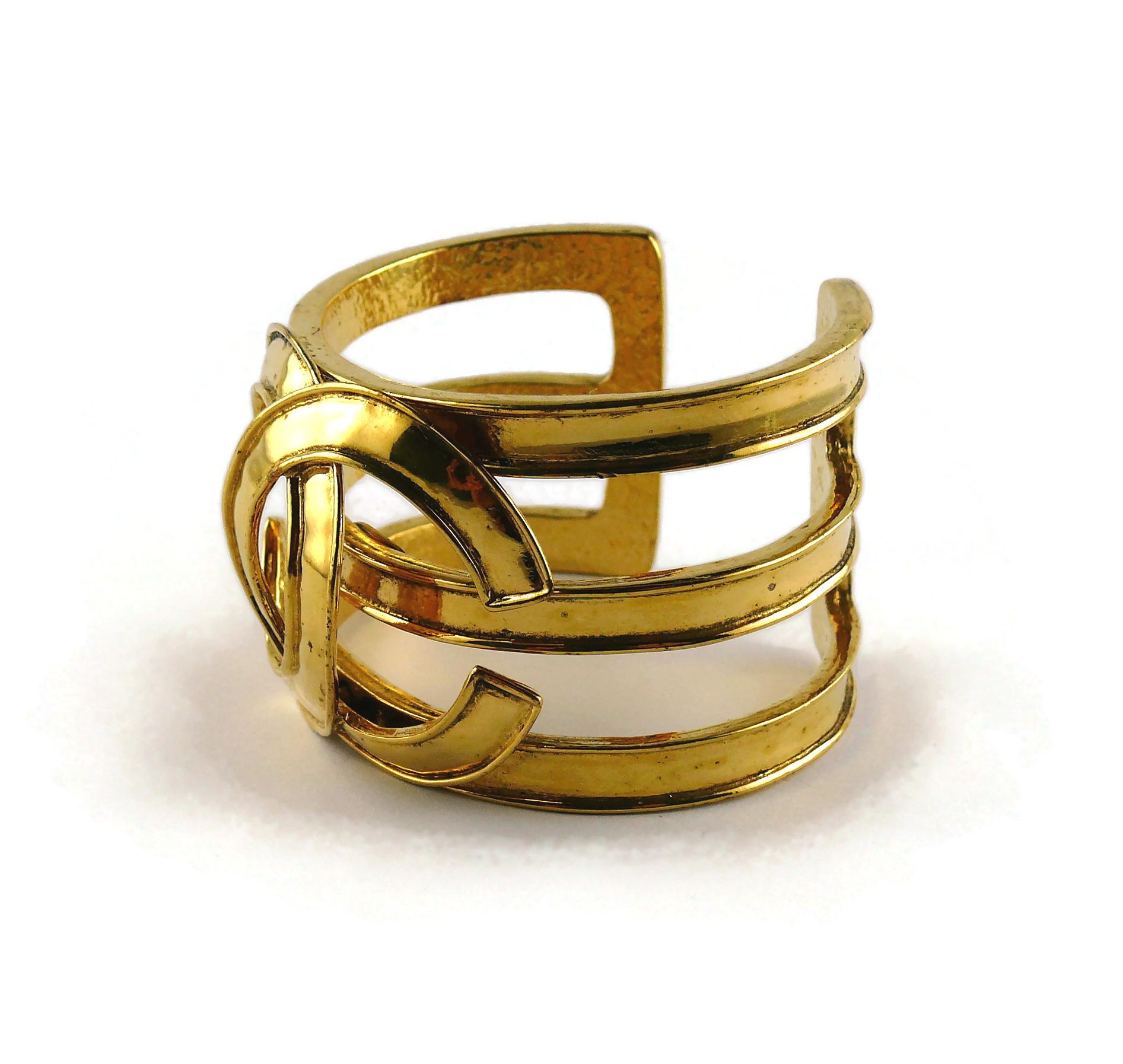 Chanel Vintage Gold Toned Openwork CC Logo Cuff Bracelet For Sale 4