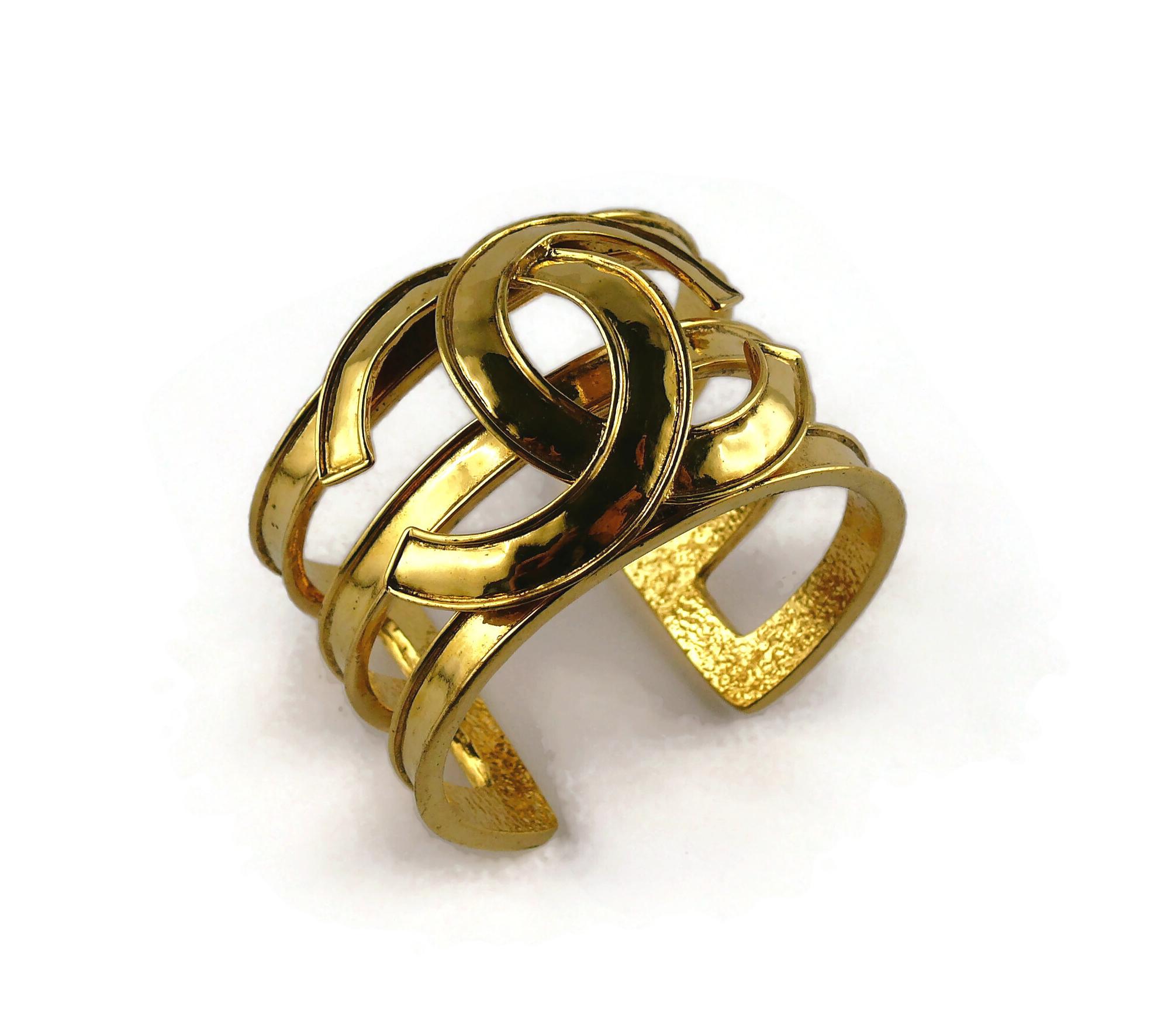 Chanel Vintage Gold Toned Openwork CC Logo Cuff Bracelet In Good Condition For Sale In Nice, FR