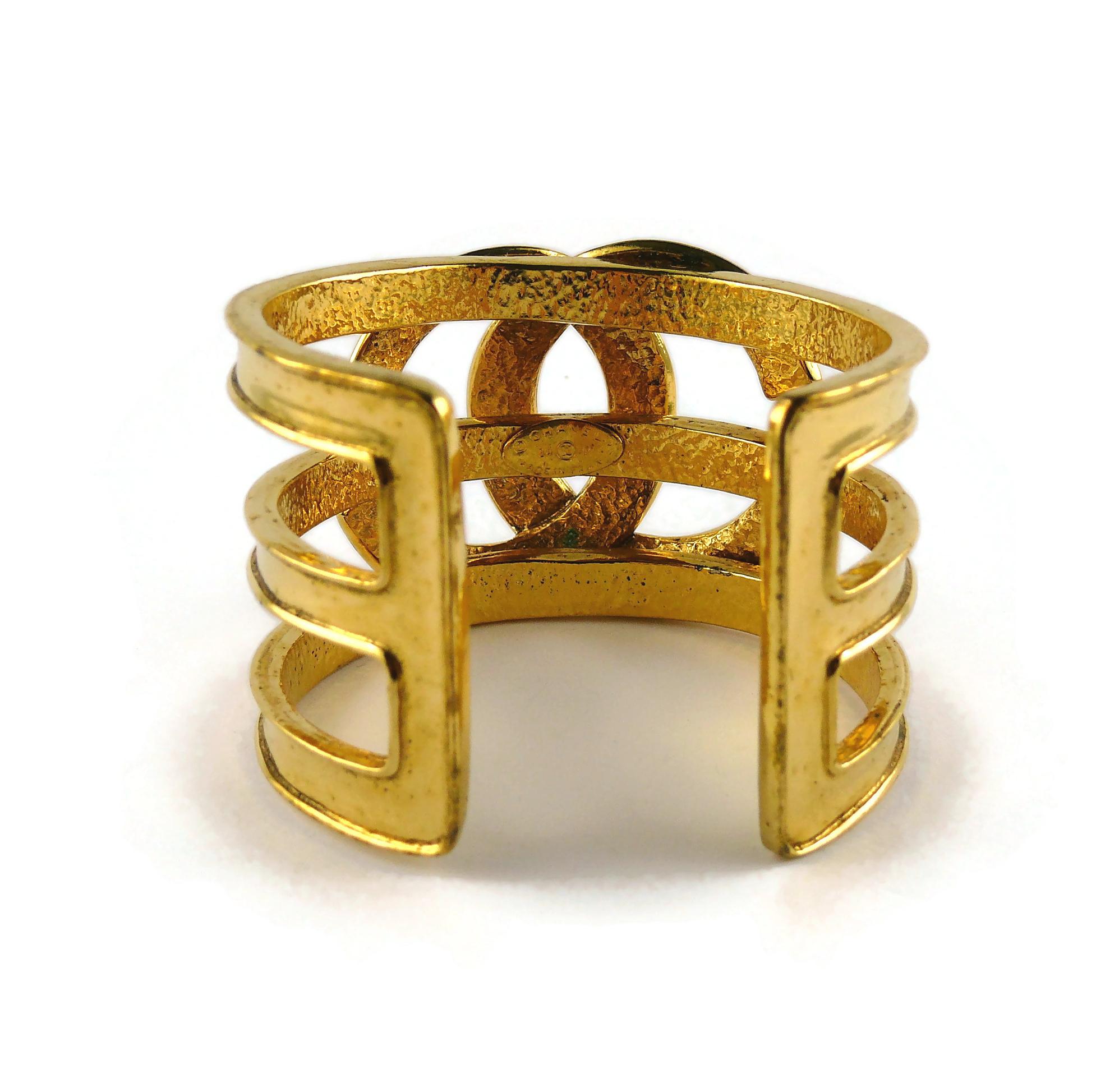 Women's Chanel Vintage Gold Toned Openwork CC Logo Cuff Bracelet For Sale