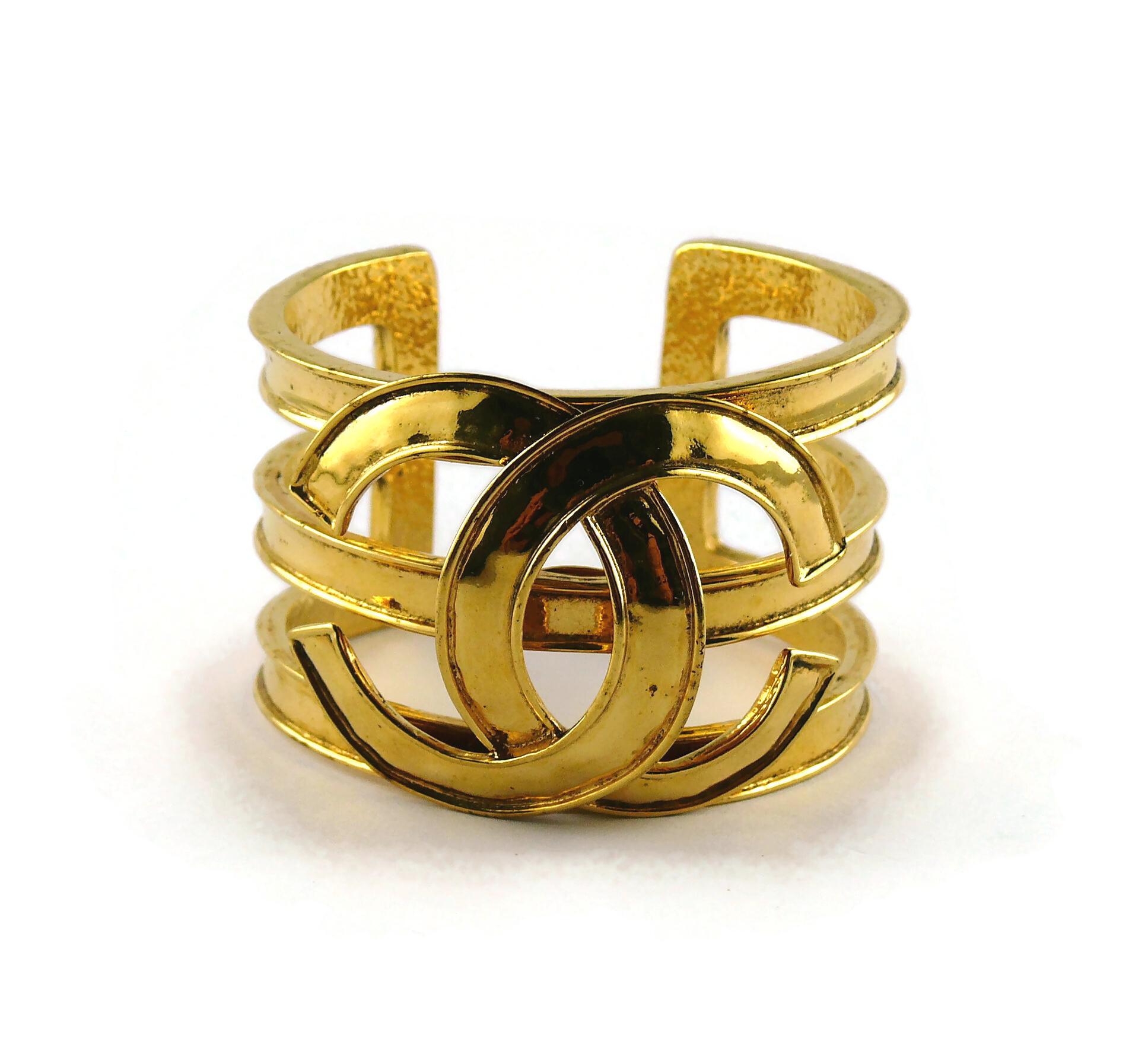 Chanel Vintage Gold Toned Openwork CC Logo Cuff Bracelet For Sale 3
