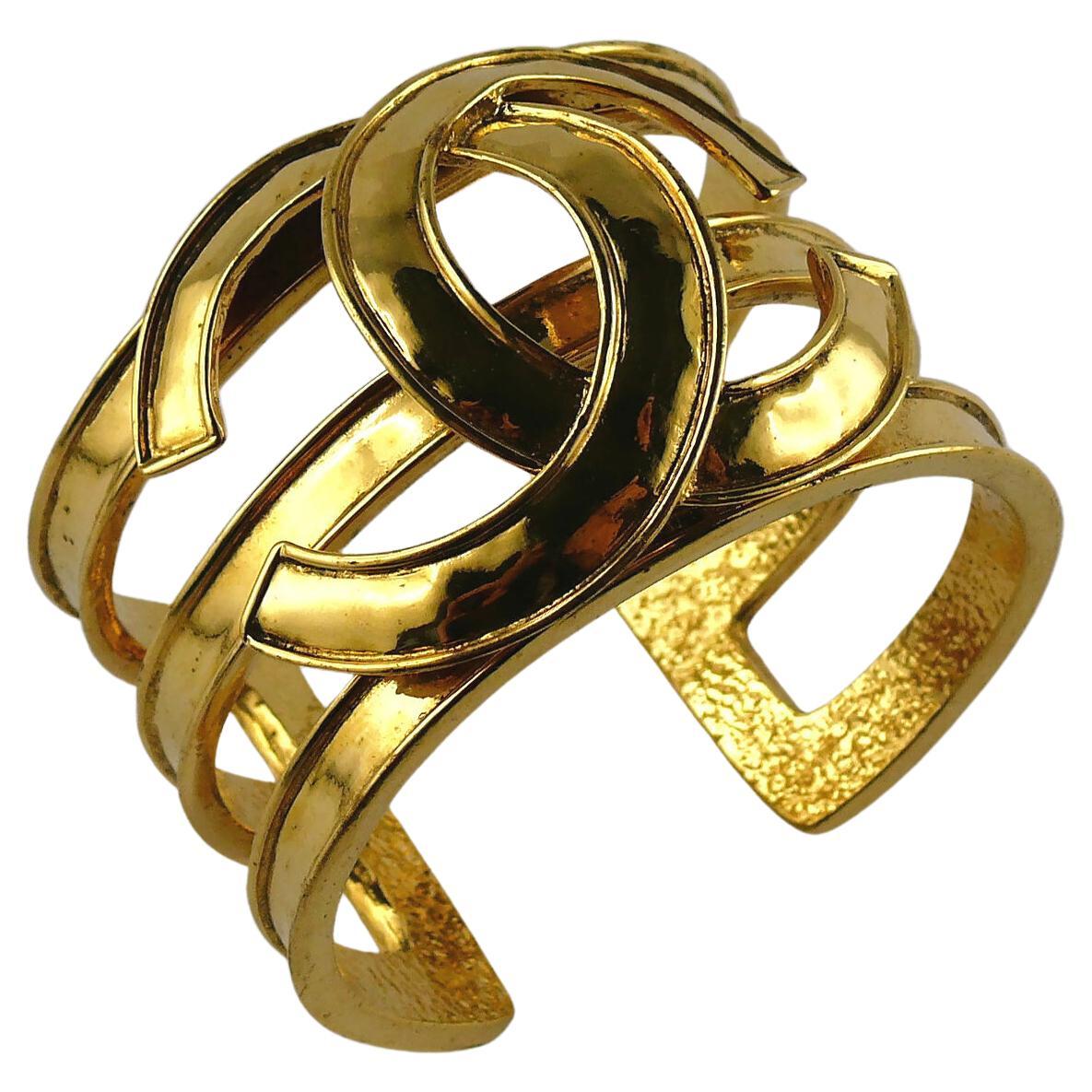 Chanel Vintage Gold Toned Openwork CC Logo Cuff Bracelet For Sale