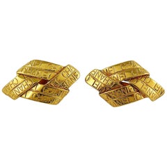Chanel Vintage Gold Toned Ribbon Motif Clip-On Earrings