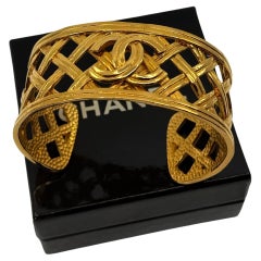CHANEL Antique Gold Woven CC Logo Cuff Bracelet