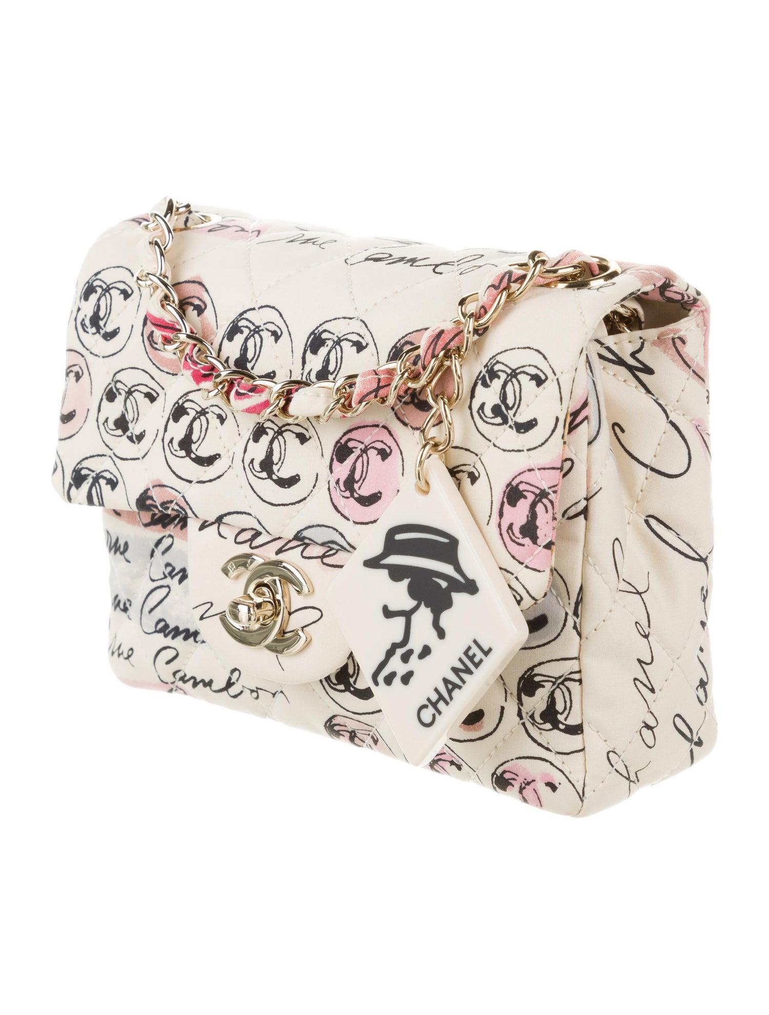 Chanel Vintage Graffiti Creme & Multicolor Mini Square CC Logo Print Flap Bag

From the Spring 2006 Collection. 
Creme and multicolor CC logo print quilted canvas Chanel Coco Mini Square Flap bag with gold-tone hardware, single chain-link and canvas
