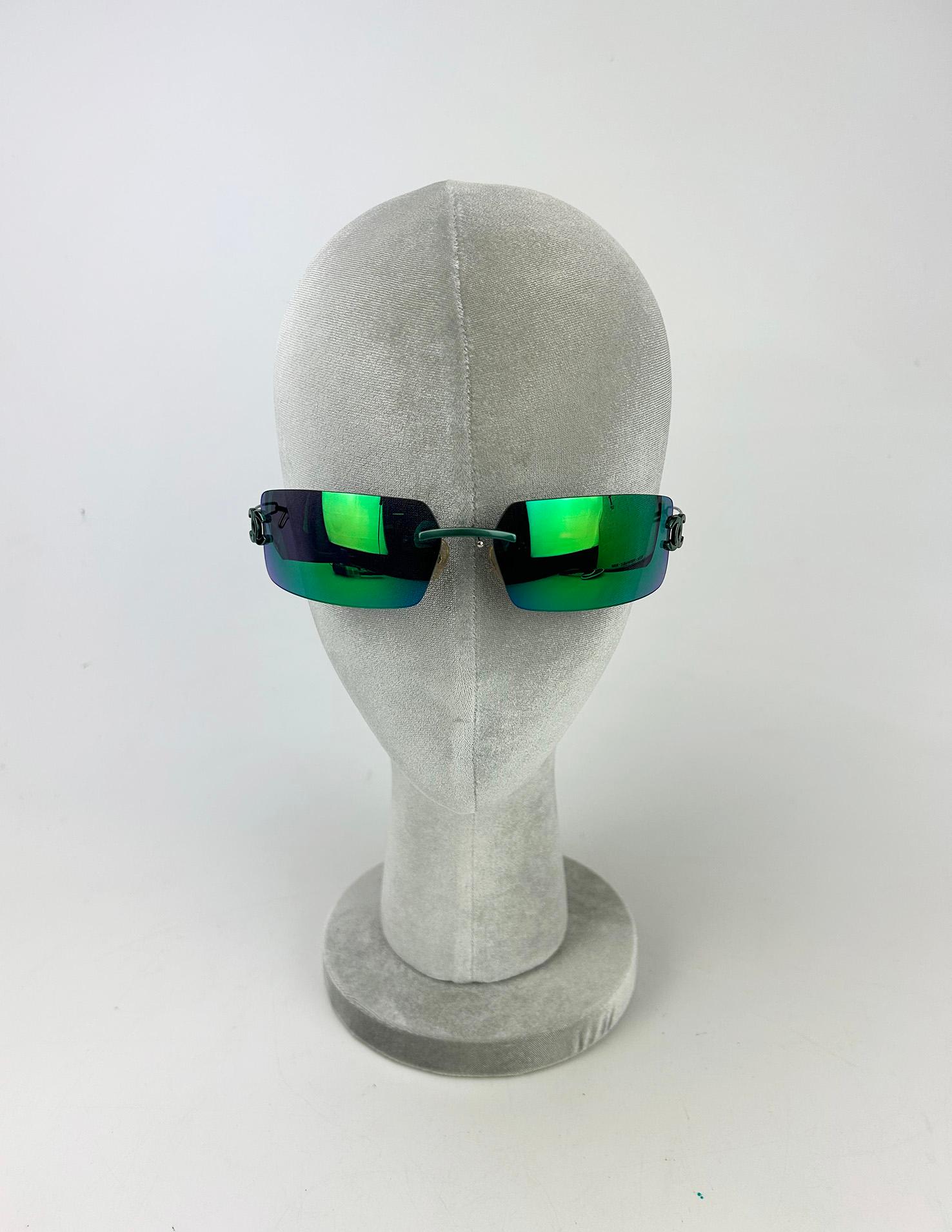 Chanel Vintage Green and Blue Floating Mirror Lens Wire Arm Sunglasses c2000s in excellent condition. Measurements: 5.5