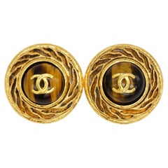 Chanel Vintage Gripoix Logo CC Coco Brown Tiger Eye Spiral Relief Clip Earrings