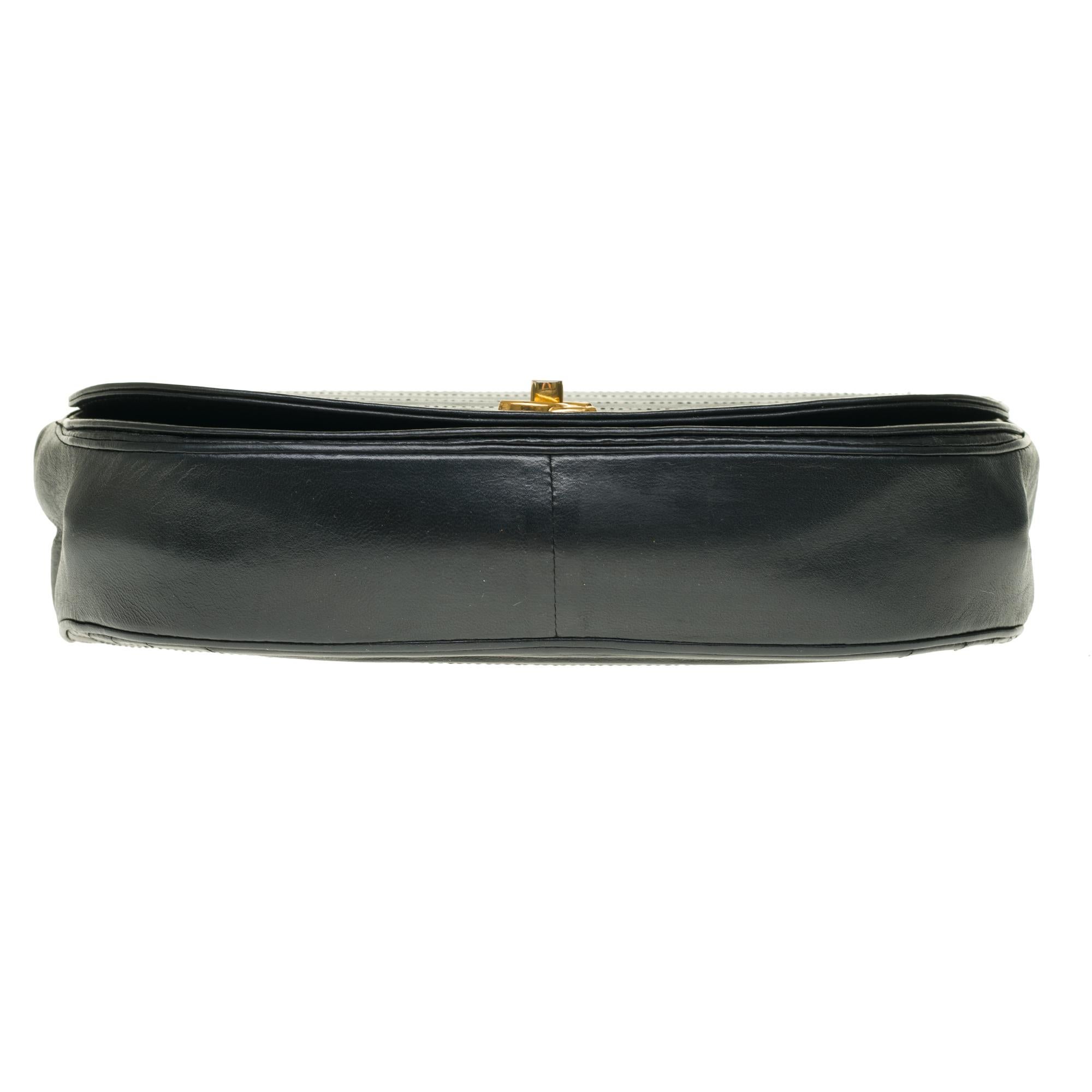 Women's Chanel vintage half moon handbag in black quilted leather, Gold hardware 