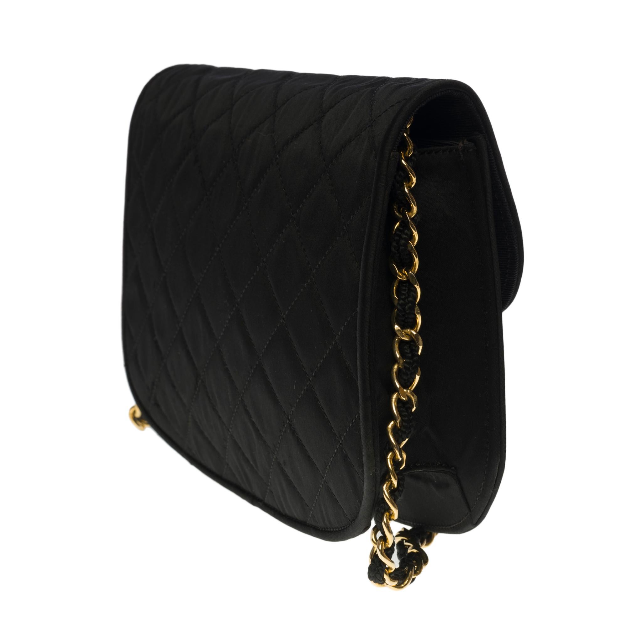 Black Chanel vintage half moon shoulder flap bag in black quilted satin, GHW
