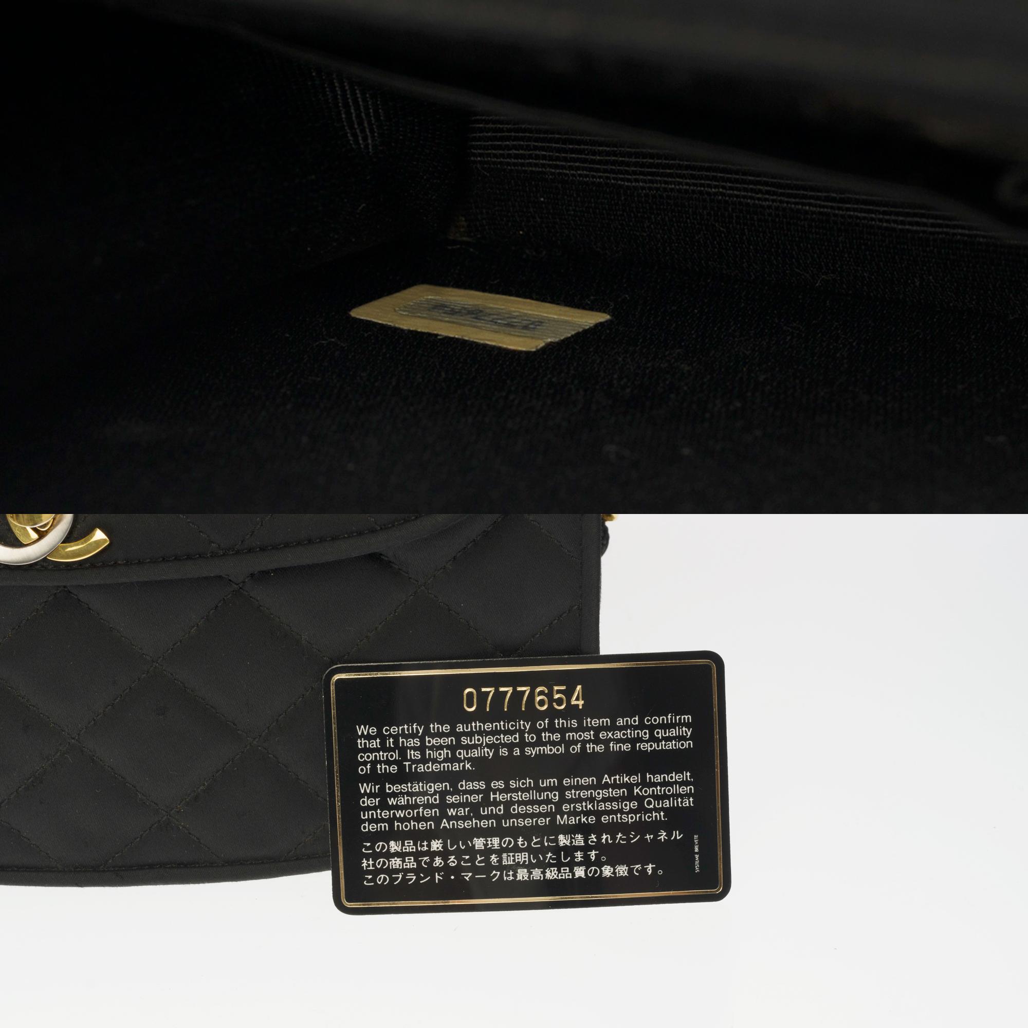 Women's Chanel vintage half moon shoulder flap bag in black quilted satin, GHW