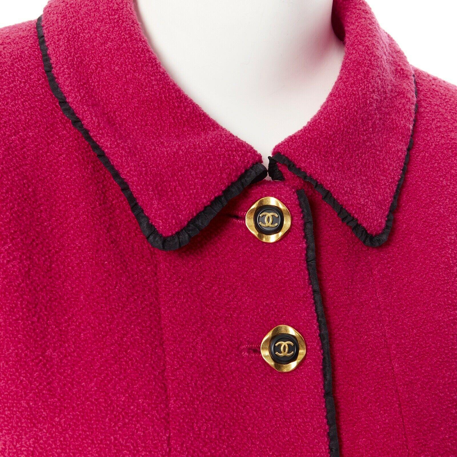 CHANEL vintage hot pink wool boucle black trim 4-pocket gold button-up jacket
Brand: CHANEL
Designer: Karl Lagerfeld
Model Name / Style: Wool jacket
Material: Other; composition label removed. Feels like wool.
Color: Pink; hot magenta
Pattern: Solid