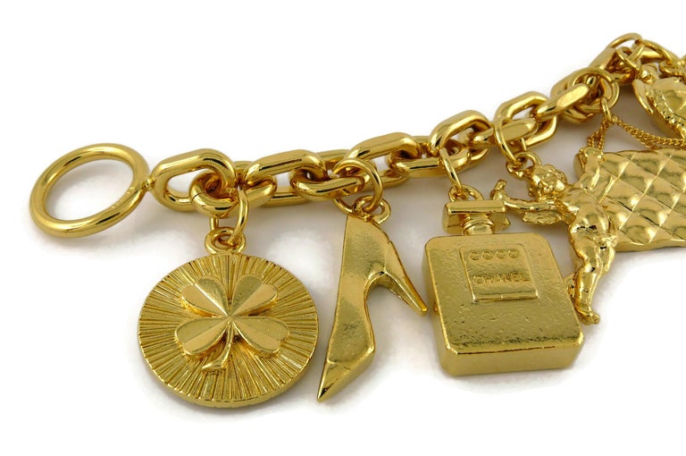 Chanel Vintage Iconic 7 Charms Gold Toned Bracelet at 1stDibs