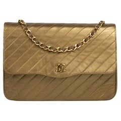 CHANEL, Vintage in gold leather