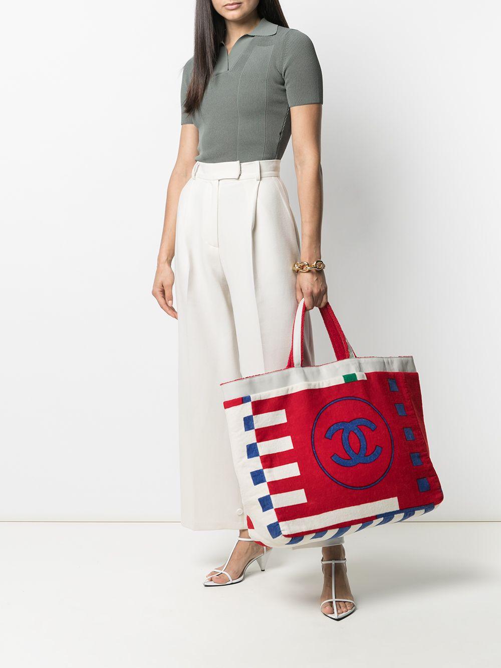 Chanel Vintage Jumbo Large CC Reversible Multicolor Lego Two Tone Red Beach Tote

white/blue/red
cotton
textured finish
logo print to the front
open top
two top handles
full lining

Made in Italy
