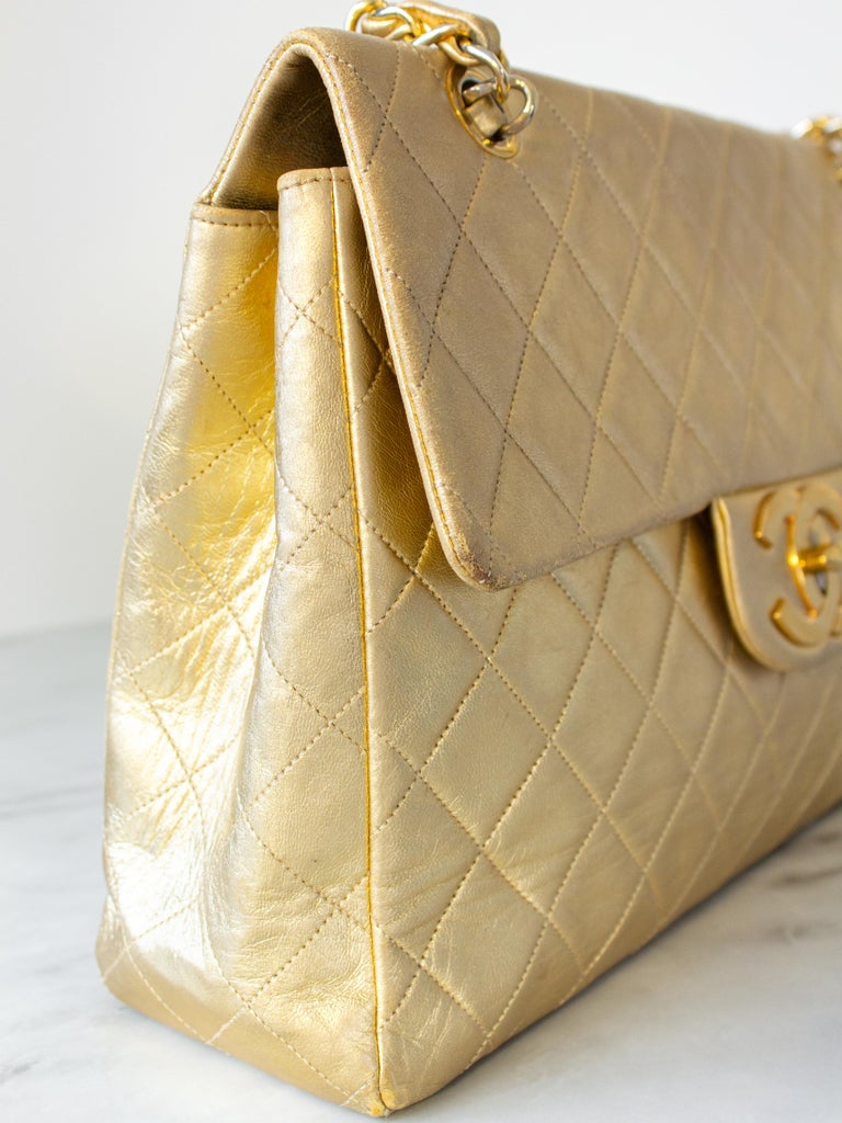 Chanel Vintage Jumbo XL Maxi Flap Metallic Gold 1990s Lambskin Bag For Sale  at 1stDibs | chanel xl flap bag, chanel gold and silver chain bag, chanel  maxi poudre