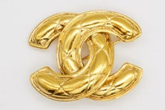 Chanel Vintage Karl Lagerfeld Iconic Matelassé Logo CC Coco Quilted Glow Brooch