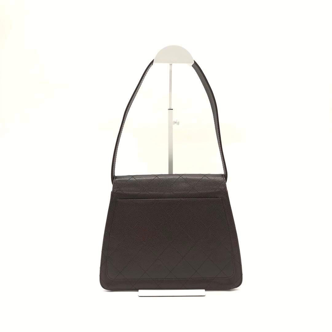 Chanel Vintage Kelly Bolso de hombro de piel de caviar marrón con herrajes de oro de 24 quilates, 1996 Negro