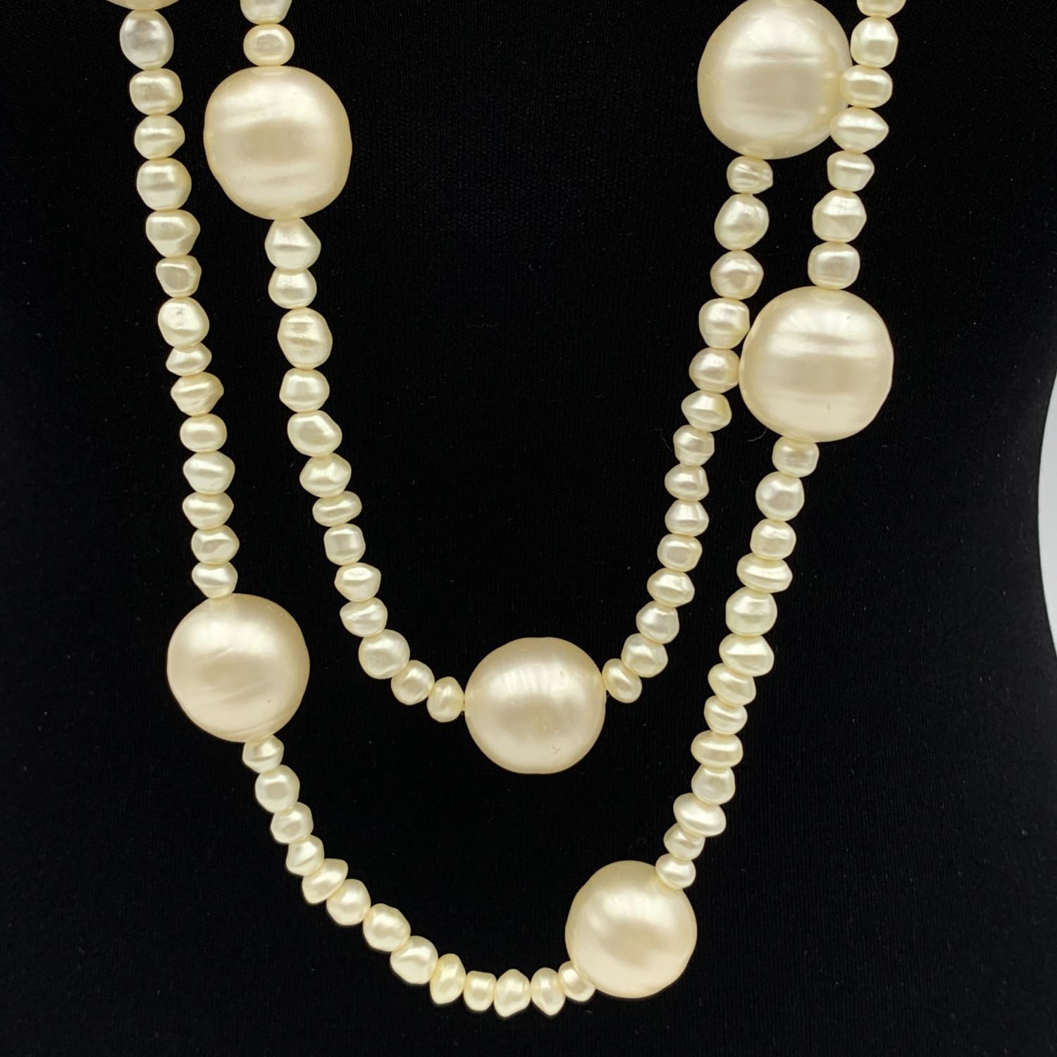 Beautiful vintage Chanel necklace by Karl Lagerfeld and Victoire de Castellane from the Ready-to-Wear Fall / Winter 1991-1992 Collection. Very long design with white baroque faux pearls, interspersed with larger pearls.  'CHANEL 2 CC 6 - Made in